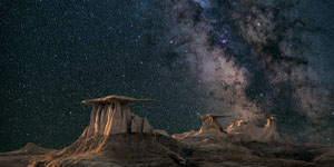 dark galaxy over mountain